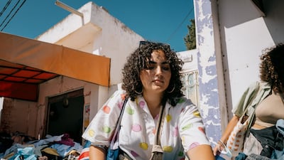 The thrill of the hunt — digging for the perfect vintage denim in one of Tunis' fripes. Photo: Erin Clare Brown / The National