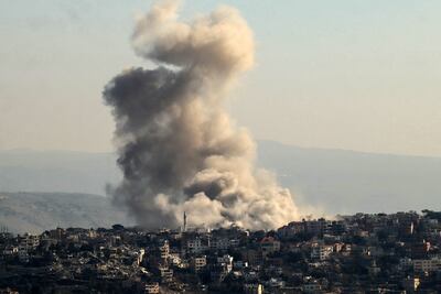Thick smoke rises from explosions as Israeli forces reportedly demolish dwellings in the border town of Khiam in southern Lebanon. AFP