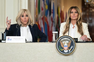 Brigitte Macron, left, and Melania Trump at the Fostering the Future Together Global Coalition Summit. AFP