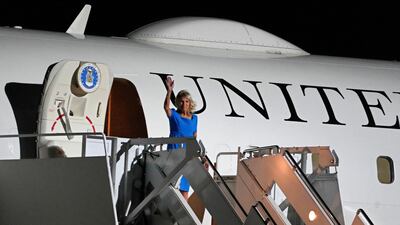US first lady Jill Biden waves on arrival at Torrejon air base in Madrid. Reuters