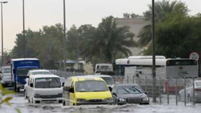 Motorists in Dubai make their way through the downpour.