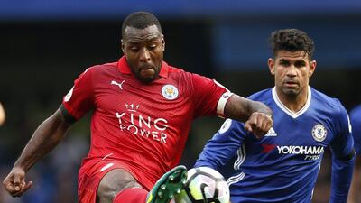 Leicester City captain Wes Morgan, left, has looked a shadow of the player whose displays helped Leicester to become Premier League champions in 2015/16. Andrew Couldridge / Reuters