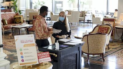 Duncan Gichana & Luliia Sliusar at the Mosaico lobby lounge in the Palazzo Versace hotel, Dubai. Chris Whiteoak / The National
