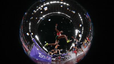 Athletes compete in the men's 3,000 metre steeplechase heats during the World Athletics Championships in Tokyo. AFP