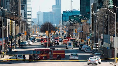 Emergency services close Yonge Street in Toronto after the van mounted a sidewalk crashing into a crowd of pedestrians. Nathan Denette/The Canadian Press via AP