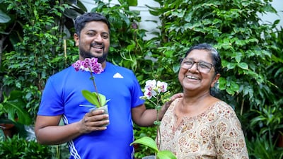 Anna Varghese and her son Arun at their shop Umm Al Salsal Trading Flowers and Indoor Plants (Shop 31)
