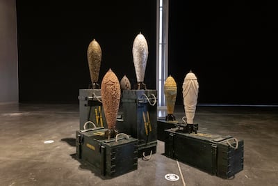 Katya Traboulsi’s missile works recast weapons through craft traditions from Yemen, Afghanistan, Armenia, Morocco and the Philippines. Photo: Alserkal Avenue.
