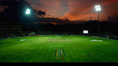 The sun sets at Pallekele Cricket Stadium in Kandi as England take on New Zealand. Gareth Copley / Getty Images