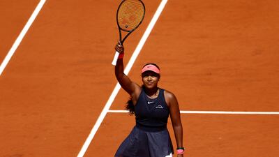 Naomi Osaka waves to the crowd at Roland Garros. Reuters