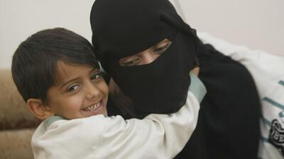 Abeer Al Hassani fears that her son Hamza, 6, will follow other family members to join Al Qaeda if they stay in Yemen. Hani Mohammed / AP Photo