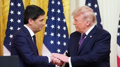 US President Donald Trump with the new head of the Federal Reserve, Kevin Warsh. AFP