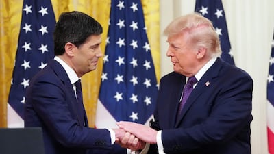 US President Donald Trump with the new head of the Federal Reserve, Kevin Warsh. AFP