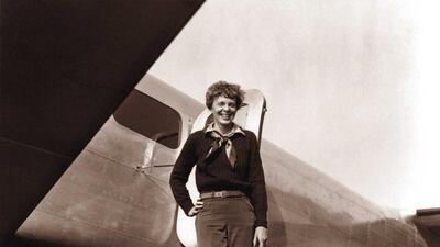 Amelia Earhart next to her Lockheed 10 Electra. Albert Bresnik / AFP