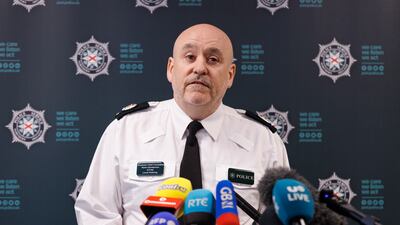 Mr Henderson speaking to the media at Police Headquarters in Belfast. PA