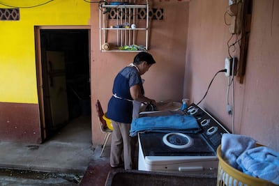Costa Rican domestic worker Aracelly Calvo irons clothes at the house where she works in Guanacaste, Canas, Costa Rica. AFP