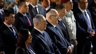 Israeli Prime Minister Benjamin Netanyahu and Israeli President Reuven Rivlin at the Mount Herzl military cemetery in Jerusalem April 4, 2019. Reuters
