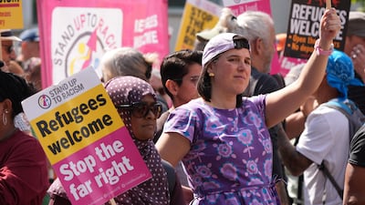 Protesters take part in the Stand Up To Racism rally in Portsmouth. PA