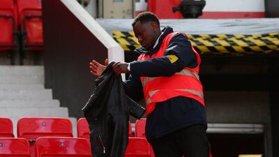 Fans are evacuated from the ground as the match is abandoned ahead of the Premier League match between Manchester United and AFC Bournemouth at Old Trafford on May 15, 2016 in Manchester, England. (Alex Livesey/Getty Images)