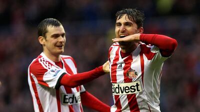 Sunderland’s Fabio Borini, right, celebrates after scoring his team’s second goal against West Bromwich Albion at the Stadium of Light on Thursday night. Ian Macnicol / AFP