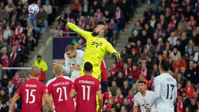 Vanja Milinkovic-Savic punches a cross during Serbia's Nations League match against Norway. EPA