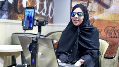 Amal Al Mansouri records an Arabic language voiceover for a cartoon for local television. Victor Besa / The National