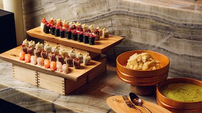 The first course is a buffet-style sushi bar with maki, sashimi and nigiri