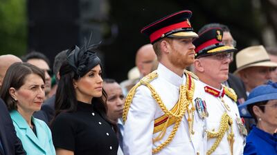 Prince Harry, centre right, and his wife Meghan, centre left, the Duchess of Sussex attend the opening of Anzac Memorial AP