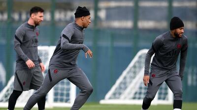 Lionel Messi, Kylian Mbappe and Neymar take part during a PSG training session. AFP