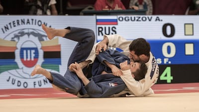 Francisco Garrigós, in blue, in action against Oguzova. Vidhyaa for The National