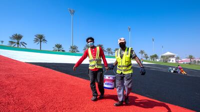 Yas Marina Circuit painting the UAE flag on Abu Dhabi Hill in preparation for the Formula 1 Etihad Airways Abu Dhabi Grand Prix 2021 this December 9-12. Victor Besa / The National
