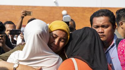 Relatives comfort each other at the crisis centre at Soekarno-Hatta International Airport in Cengkareng, Jakarta. Bloomberg