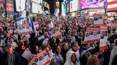Protesters call for the release of hostages held by Hamas during a demonstration in the Times Square district of New York. Bloomberg