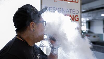 Electronic devices used to inhale nicotine vapour, removing the need to smoke tobacco, have been banned in the UAE since 2011 but there is a thriving black market for the products. Victor Besa for The National