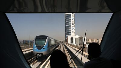 DUBAI , UNITED ARAB EMIRATES Ð Sep 3 , 2014 : People traveling in Dubai Metro in Dubai. ( Pawan Singh / The National ) For News. Story by Preeti & Martin
