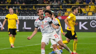 Thomas Muller celebrates after scoring Bayern's second goal.
