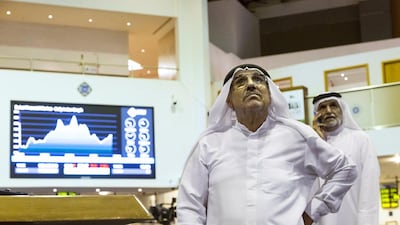 Currency pegs to the US dollar or a basket of major currencies provide a major policy anchor for GCC countries. Above, traders at the Dubai Financial Market. Duncan Chard for The National