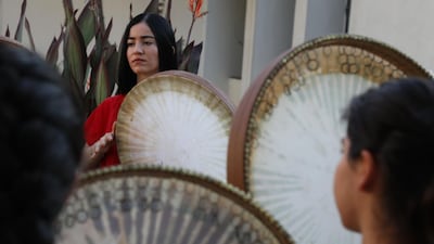 Young Yazidi and Muslim women rehearse a traditional Kurdish song in a community centre in Dahuk, about 430 km northwest of the Iraqi capital Baghdad, on June 25, 2019. AFP