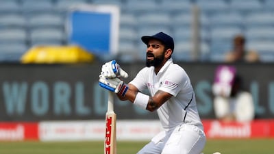 India's cricketer Virat Kohlitakes a break. AP