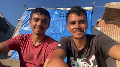Mahmoud Hasanain, left, a computer science student at the University of Glasgow, was living in a displacement camp in Gaza with his brother Mohammed before moving to the UK to study. Photo: Mahmoud Hasanain