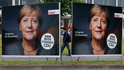 Election posters of German chancellor Angela Merkel on street in Frankfurt on September 20, 2017, five days before Germany's general election. AP Photo / Michael Probst