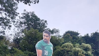 Salem Al Dawsari has joined a giant cutout collection at a Keral village, joining superstars Lionel Messi, Cristiano Ronaldo and Neymar. Photo: Pullavoor football fans
