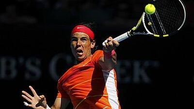 Rafael Nadal overcame the dangerous serving Croatian Ivo Karlovic to set up his quarter-final match with the Briton Andy Murray.