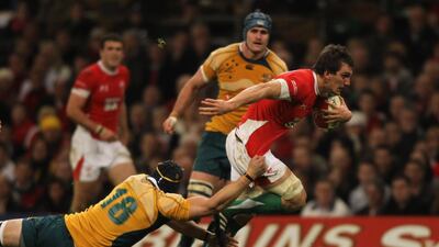 Warburton through the tackle of Mark Chisholm of Australia during the Invesco Perpetual Series match between Wales and Australia at the Millennium Stadium in Cardiff, Wales, on November 28, 2009. Getty Images