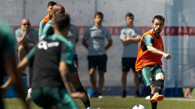 Portugal's Bernardo Silva, right, plays the ball with teammates during the training session of Portugal at the 2018 soccer World Cup in Kratovo, outskirts Moscow on Friday. Francisco Seco / AP Photo