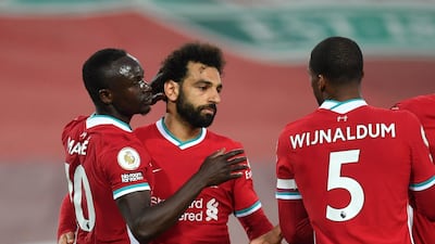 Liverpool's Sadio Mane, left, celebrates with Mohamed Salah. AP