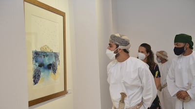 Dhi Yazan bin Haitham tours the exhibition titled “The Coast, Society and Protection," by Juana Mullet, at Bait al Baranda in Muttrah. Oman News Agency