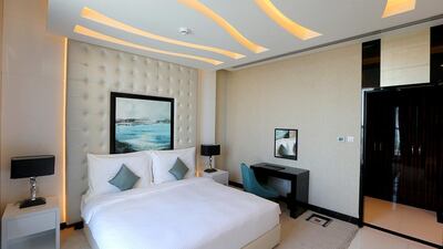Owners of the 355 serviced apartments are given the choice of whether to live in their apartment, rent it out privately or to put it into the Damac rental pool. Satish Kumar / The National