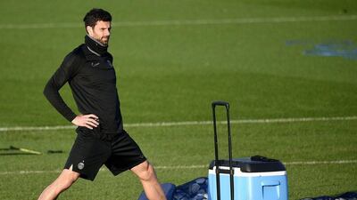 PSG’s Thiago Motta shown stretching on Monday during his team’s Champions League training session. Franck Fife / AFP