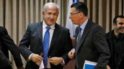 Benjamin Netanyahu, the Israeli prime minister, left, talks to Gideon Saar, the education minister, who has threatened to "punish" academics who support a boycott of Israel.