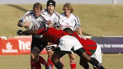 Alistair Thompson, left, above playing in the Emirates Airline Cup of Nations, turned out against Japan in the Asian Five Nations. The UAE team landed home at 4am, Thompson was back in school teaching three hours later.